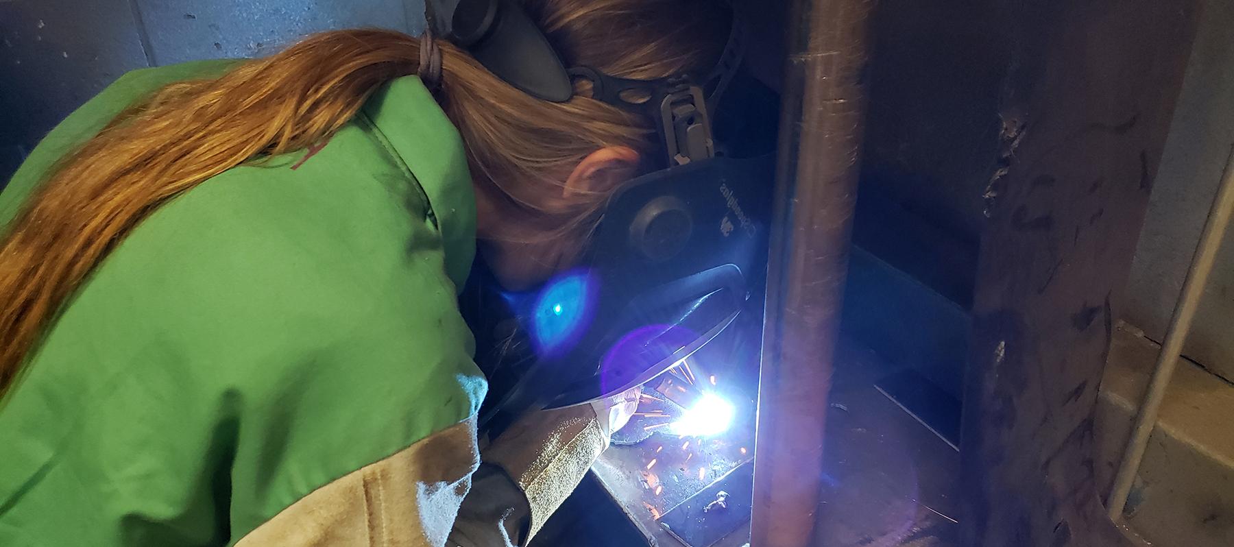 girl welding